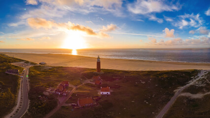 Drone aerial view at the Texell lighthouse during sunset Netherlands Dutch Island Texel in summer...