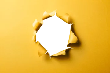 Foto auf Leinwand 穴の空いた黄色い紙の背景テクスチャー © hanahal