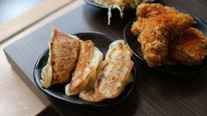 Set menu appetizer of japanese gyoza and chicken karage.