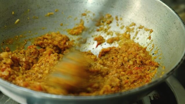  frying masala in kadai for the vegetable  Kofta curry an Indian Food, 4k, Close up shot 