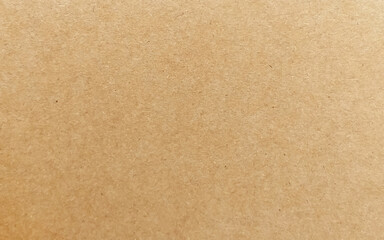 Rough brown paper seamless pattern. Brown color paper shown grain details on it's surface.