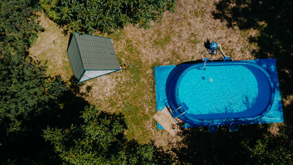 Aerial View of wooden holiday house with swimming pool - 637720243