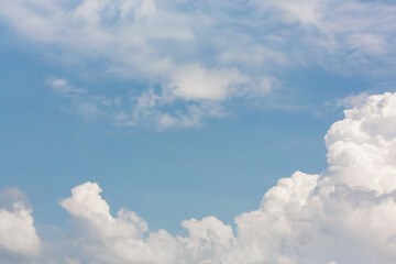 Naklejka na ściany i meble Beautiful cumulus clouds in sunny summer day. Atmosphere background or wallpaper