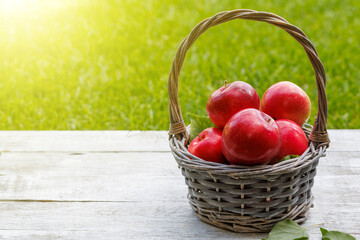 Basket with fresh red apples