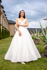 Fashion bride in wedding dress. Summer wedding