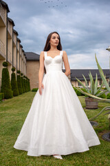 Fashion bride in wedding dress. Summer wedding