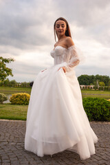 Fashion bride in wedding dress. Summer wedding