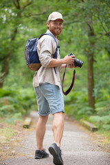 professional nature photographer on hike