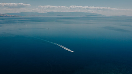 Aerial View of the Adriatic Sea and a Mini Boat - 637743286