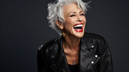 Radiant senior woman laughing, beauty in aging.