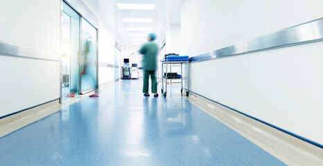 Doctors and nurses walking in the hospital hallway