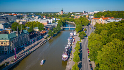  Turku river, boats and Cathedral in Finland