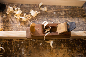Carpentry tool. Hand plane. Old tools. Joinery tool. Wood shavings, chip