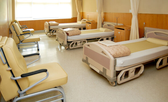 Clean empty beds in hospital ward