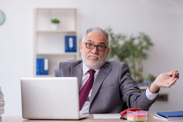 Old male employee and too much work in the office