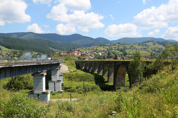 Old and new bridge in Vorokhta, Carpathians, Ukraine