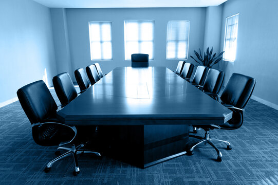 Empty business meeting room with chairs in a row