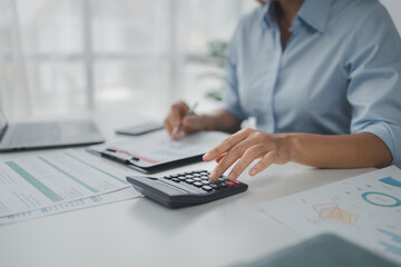 Person working with documents on desk, accountant checking company budget accounting documents,...