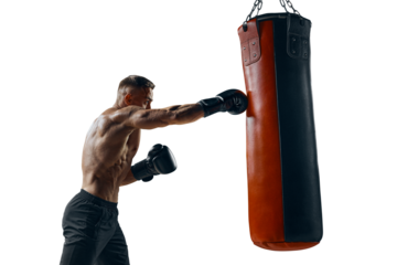Male boxer punching a big boxing bag. Isolated PNG photo.