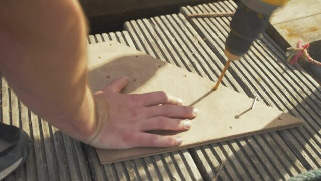 Drilling countersink for screws in plywood