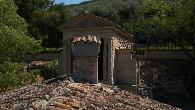 Aerial View Of Temple of Clitumnus, Flying Over Roof Tiles And Chimney. Dolly Right