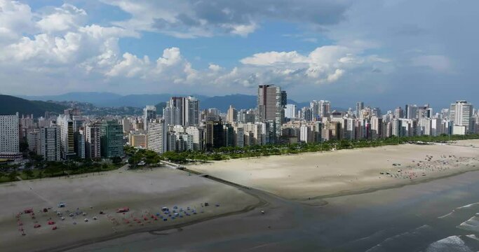 Establishing Aerial view of the coastline of Santos city, sunny day in Brazil