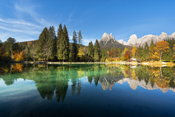 Picturesque view at autumn Welsperg lake in Dolomite Alps. Canali Valley, Primiero San Martino di...