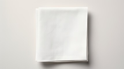 White kitchen napkin with copy space isolated on table background . Mockup image