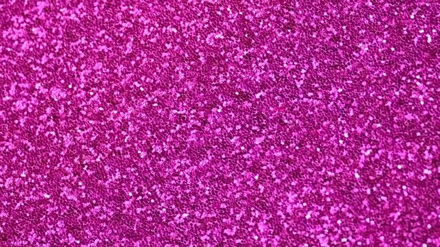 Moving pink sparkle glitter wallpaper. Christmas, New Year or any other holiday or party background. Magenta shiny background