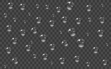 Transparent round water drops on a smooth surface.Rain drops