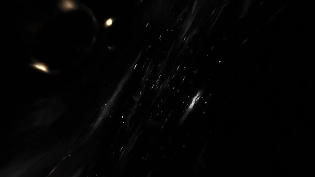 Black background of the universe expanding. Seamless loop