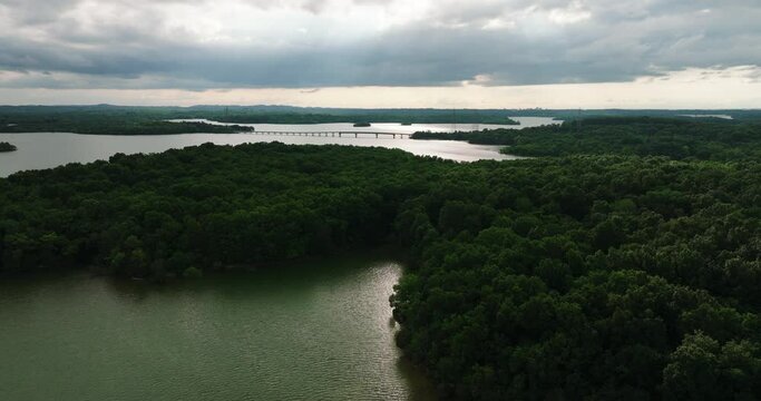 View Of Hobson Pike From Forested Landscape On A Dramatic Sunset. Percy Priest Lake And Long Hunter State Park In Tennessee, USA. wide aerial