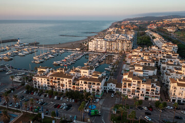 Fototapeta premium Beautiful view of Puerto de la Duquesa , sunrise, marina view captured from drone, aerial photography
