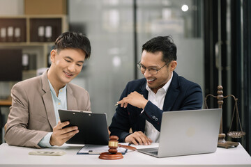 Lawyer business man working with paperwork on his desk in office workplace for consultant lawyer in office.