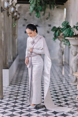 Beautiful Thai girl in Thai traditional costume.Bride Thai girl Beautiful.