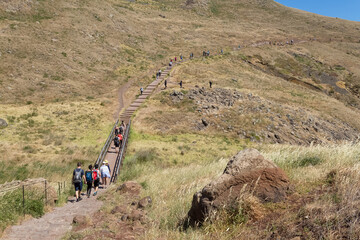 View of a group of tourists hiking in St. Lourenço Cape or Cabo de São Lourenço, on Madeira Island, Portugal