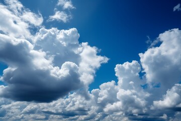 Obraz premium A clear blue sky with fluffy white clouds