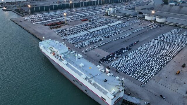 Many new cars running cargo ship, Ro-Ro Ship for import export shipping cars by Vessel Freight forwarding service ship, Logistics transportation dealer shipping Cars Cars Export Terminal 