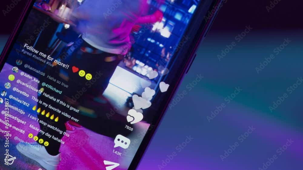 Poster close up on smartphone screen: likes button and counter for female and male dancers streaming a chor
