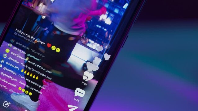 Close Up on Smartphone Screen: Likes Button and Counter for Female And Male Dancers Streaming a Choreography Online on Social Media Mobile App. Internet Users Cheering for the Live Performance
