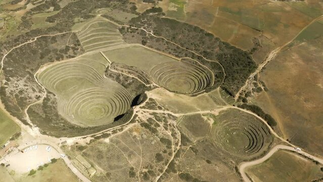 Aerial view of Moray Archeological site. Inca ruins of several terraced circular depressions, in Maras, Cusco province, Peru.