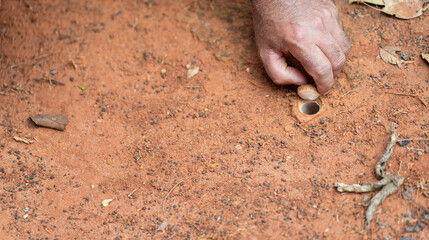 Discreetly Lifting the Terrain Camouflaged Spider Lair at Night