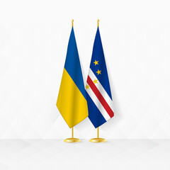 Ukraine and Cape Verde flags on flag stand, illustration for diplomacy and other meeting between Ukraine and Cape Verde.
