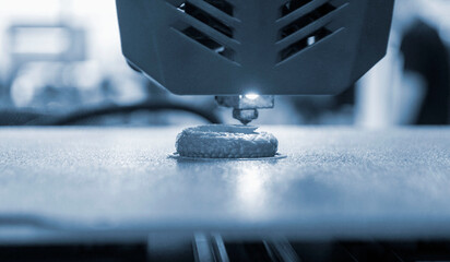 3D printer. 3D printing. 3d printer printing process close-up. 3D printer creating object from...