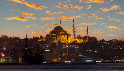 Beautiful view of gorgeous historical Suleymaniye Mosque, Rustem Pasa Mosque and buildings in front of dramatic sunset. Istanbul most popular tourism destination of Turkey
