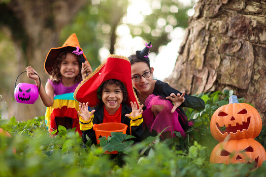 Kids trick or treat. Halloween fun for children.