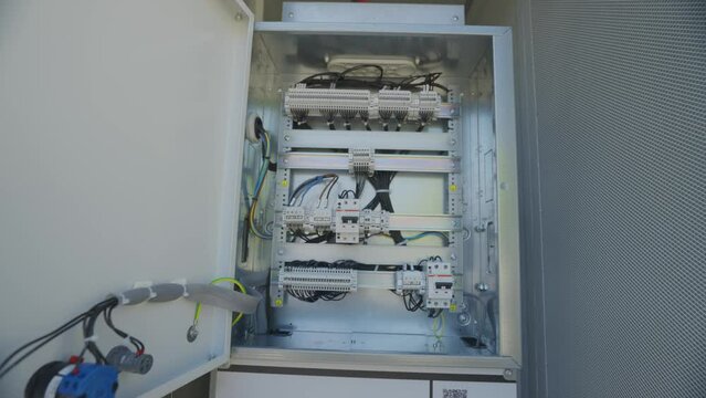 Distribution board of diesel generator. Electrical panel of an industrial generator. Distribution board of the generator inside. Intelligent micro grid control cabinet