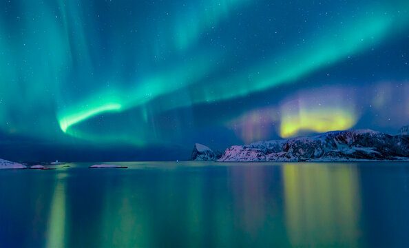 Northern lights or Aurora borealis in the sky over Tromso, Norway