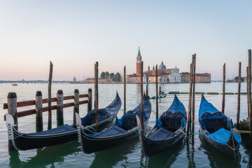 Sunrise in San Marco square, with gondolas on the Venice Grand Canal, Venice, Italy © Sen