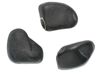 Three black sea pebble stones isolated on a white background.